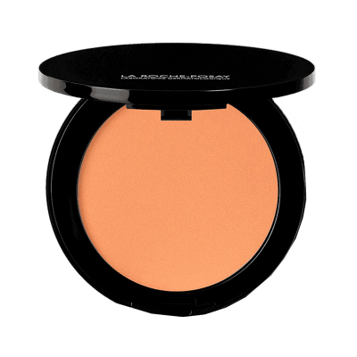 pó compacto de maquilhagem bege em embalagem preta redonda
