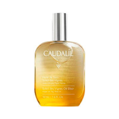 Frasco de óleo elixir Caudalie amarelo dourado com tampa prateada