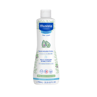 Frasco de creme Mustela com 750 mL, decorado com abacate e folhas, texto em francês e inglês.