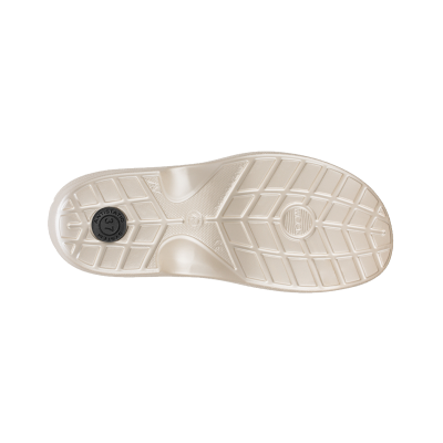 Sola de sapato creme com padrão antiderrapante e marcações em preto