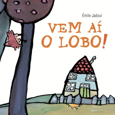 Capa de livro infantil com árvore, casa e texto VEM AÍ O LOBO!