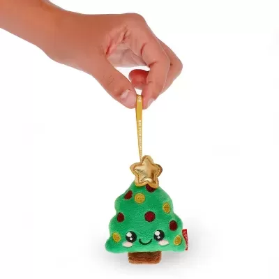 Pelúcia de árvore de Natal verde com detalhes coloridos e rosto sorridente