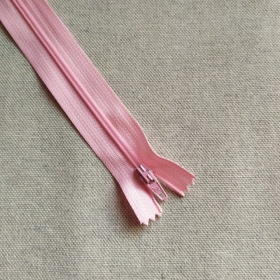 Fecho de correr rosa claro com texto Cor 534