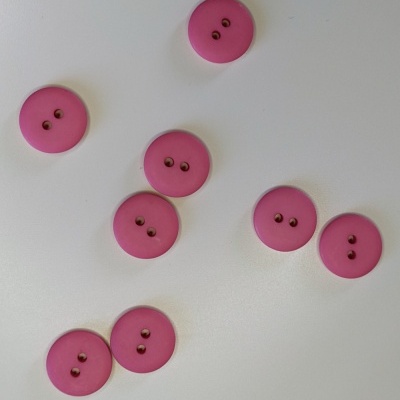 Botões rosa escuro redondos com dois furos sobre fundo branco e texto 'Rosa escuro'