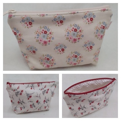 Três necessaires de tecido com padrões florais e fecho de correr