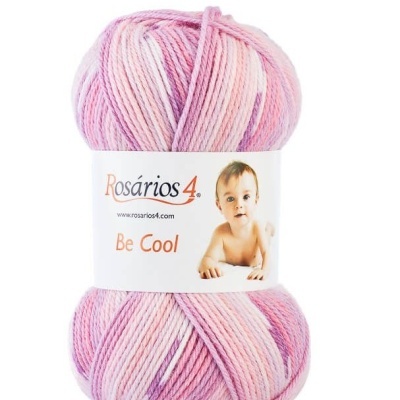 Novelo de lã rosa e branco com etiqueta Rosários 4 e bebé