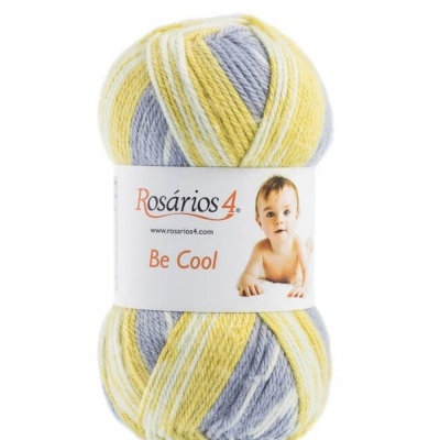 Novelo de lã multicolor com etiqueta e bebé na etiqueta