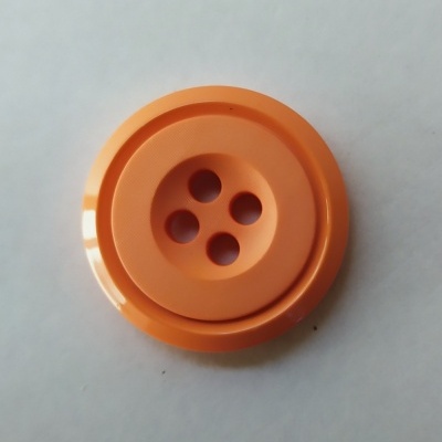 Botão laranja plástico com quatro furos