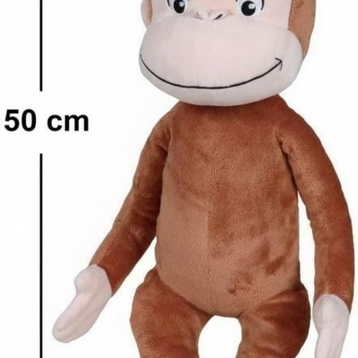 Pelúcia de macaco castanho com rosto bege e sorriso bordado.