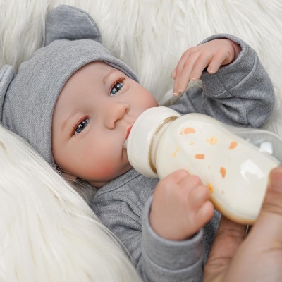 Boneca Bebé Reborn menino 46cm corpo inteiro em Silicone Vinílico, olhos abertos, com acessórios