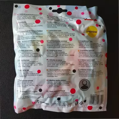 Embalagem branca com pontos coloridos e texto impresso