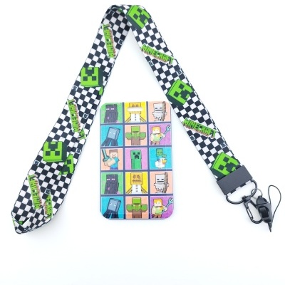 Cordão preto e branco com estampas verdes e cartão com personagens Minecraft coloridos