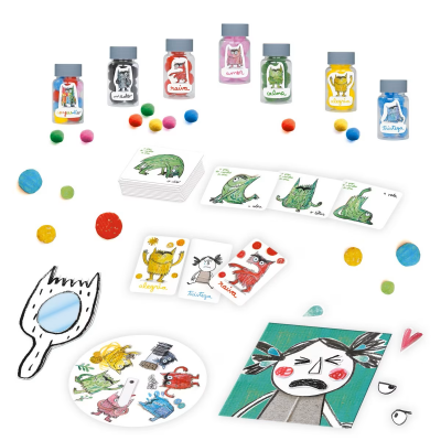 Conjunto de frascos com bolinhas coloridas e cartas ilustradas com monstros e palavras em português.