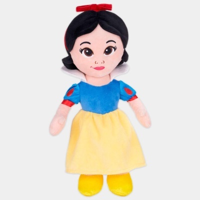 Boneca de pelúcia com vestido azul e amarelo e cabelo preto com laço vermelho