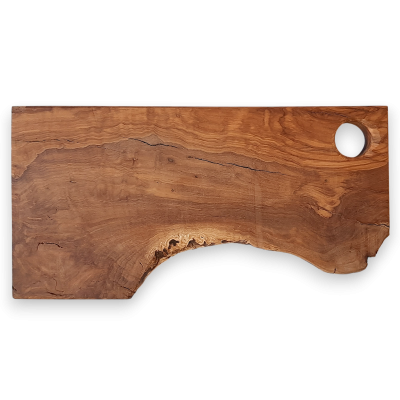 Tabuleiro de cortar de madeira com textura natural e buraco circular no canto
