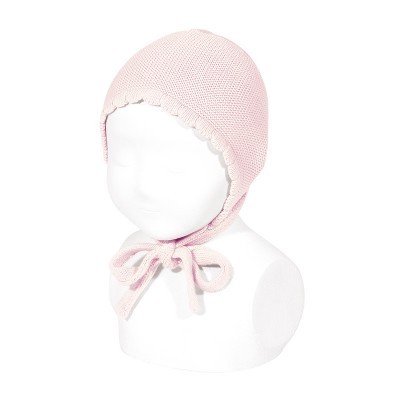 Gorro rosa de malha para bebé com laço amarrado