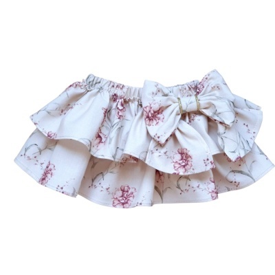 saia de bebé branca com padrão floral rosa e laço grande