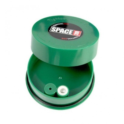 Caixa redonda verde com tampa e duas peças cilíndricas verde e branca no interior