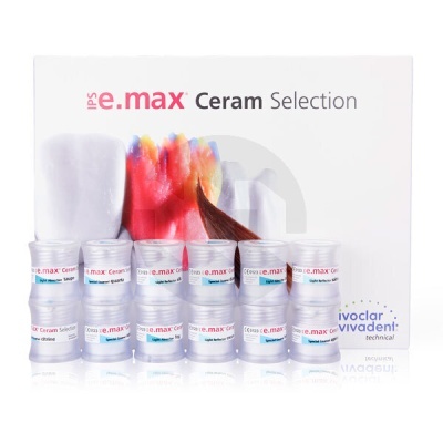 Set of eight IPS e.max Ceram Selection containers in front of white packaging box