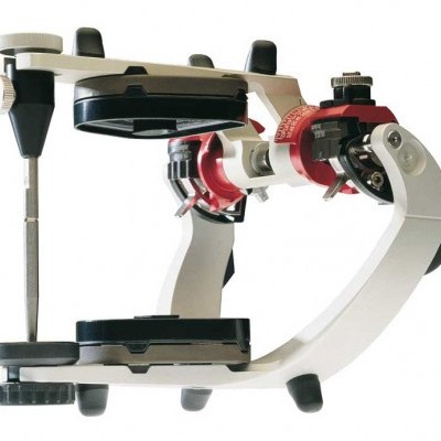 Aparelho odontológico de medição branco e vermelho em fundo branco