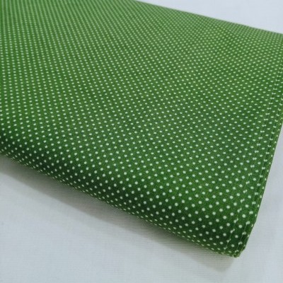 pintinhas brancas em fundo verde azeitona