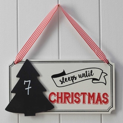 placa decorativa "sleeps until Christmas"