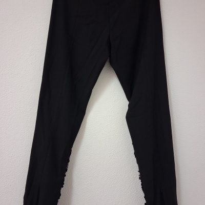 Calças pretas com lantejolas