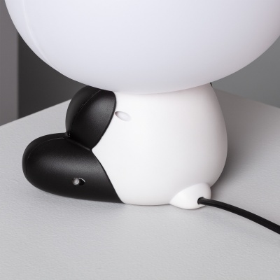 Base de candeeiro de mesa em forma de cabeça de cão preto e branco com cabo preto