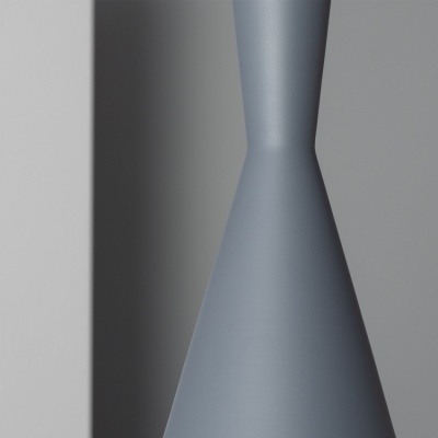 Objeto cinzento cónico com superfície lisa e fosca