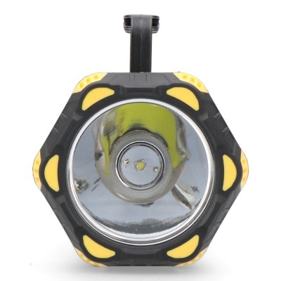 Lanterna preta e amarela com lente refletora circular