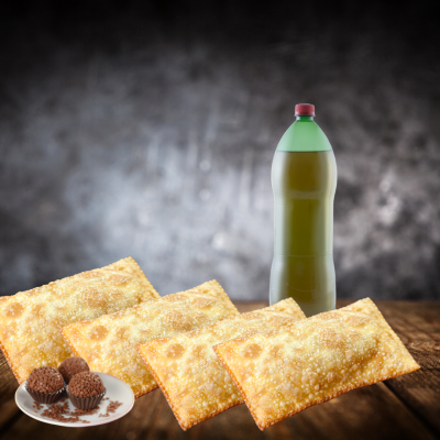 Quatro pastéis fritos, cinco brigadeiros em prato branco e garrafa verde com líquido amarelo