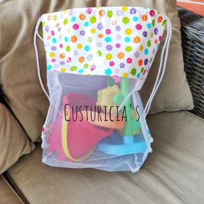 Saco de brinquedos flores