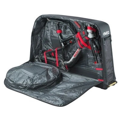 Mala de transporte preta EVOC com interior acolchoado e bicicleta desmontada dentro