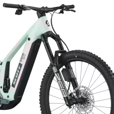 Bicicleta elétrica de montanha SCOTT verde claro com suspensão ROCK SHOX e pneus pretos