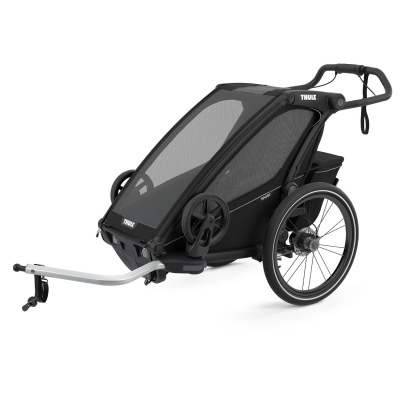 Carrinho preto Thule para bicicleta com rodas grandes e cobertura de tecido de rede