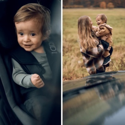 Bebé num assento de carro e mulher a segurar bebé num campo fora do carro