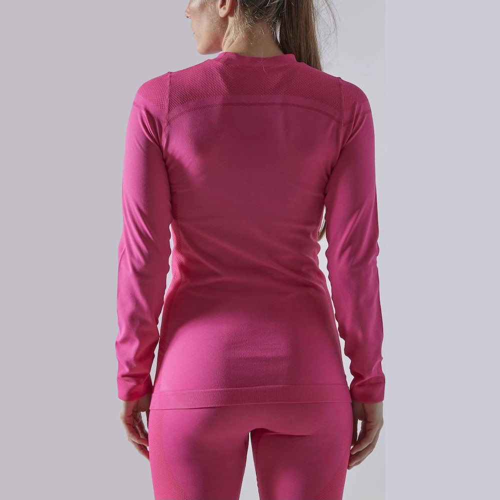 Conjunto de roupa desportiva rosa vista de costas