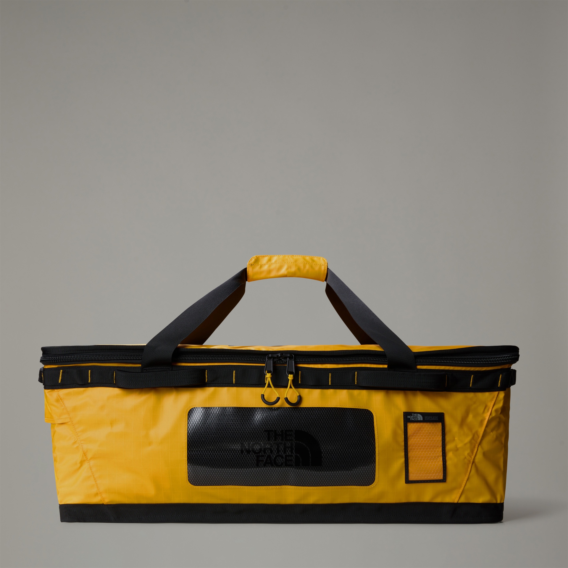 Mala de viagem amarela e preta The North Face com alças e fecho
