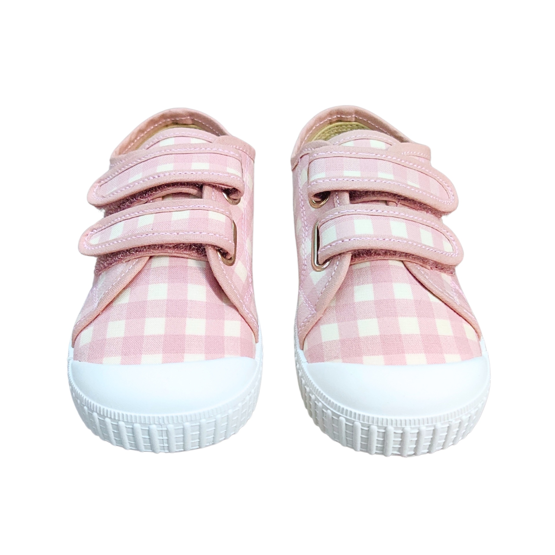 Sapatilhas infantis rosa xadrez com velcro e sola branca.