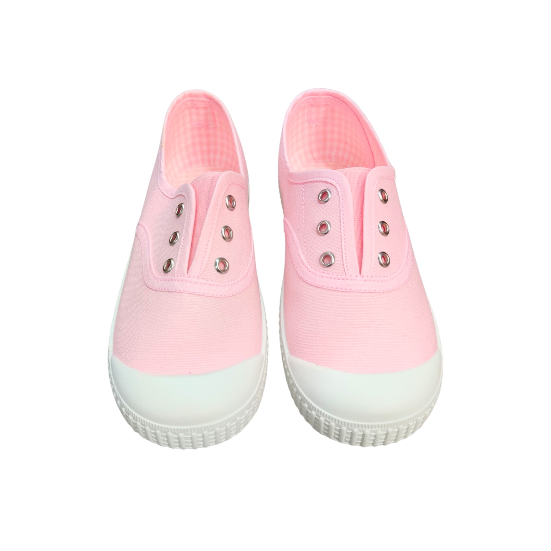 Sapatilhas cor-de-rosa de lona com sola branca e ilhós metálicos