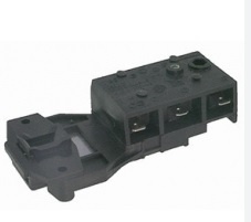 Peça eletrónica preta de plástico com base, na superfície branca