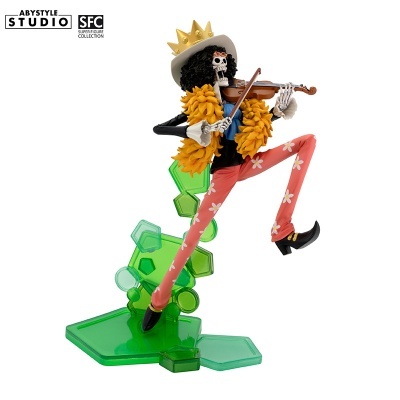 Figurina colorida de esqueleto tocando violino com base verde