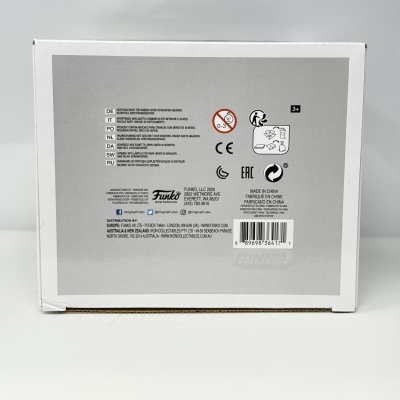 Parte traseira da embalagem de produto Funko com texto e símbolos de segurança e origem.