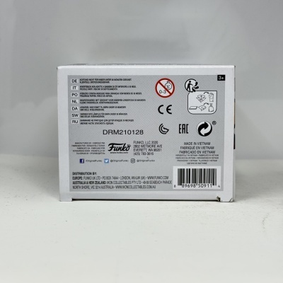 Caixa branca com texto em diversas línguas e simbolos de segurança