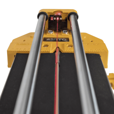 Máquina de corte manual amarela com base preta e barras metálicas