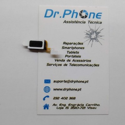 Componente eletrônico sobre cartão de visita da assistência técnica Dr.Phone