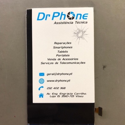 Cartão de visita Dr Phone sobre componente electrónico