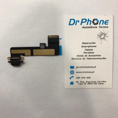componente eletrónico preto e dourado com cartão de visita da Dr Phone