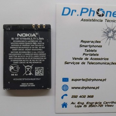 Bateria Nokia BL-5BT ao lado de cartão de visita da empresa Dr. Phone