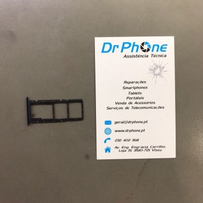 Suporte para cartões SIM preto ao lado de cartão de visita branco da Dr Phone